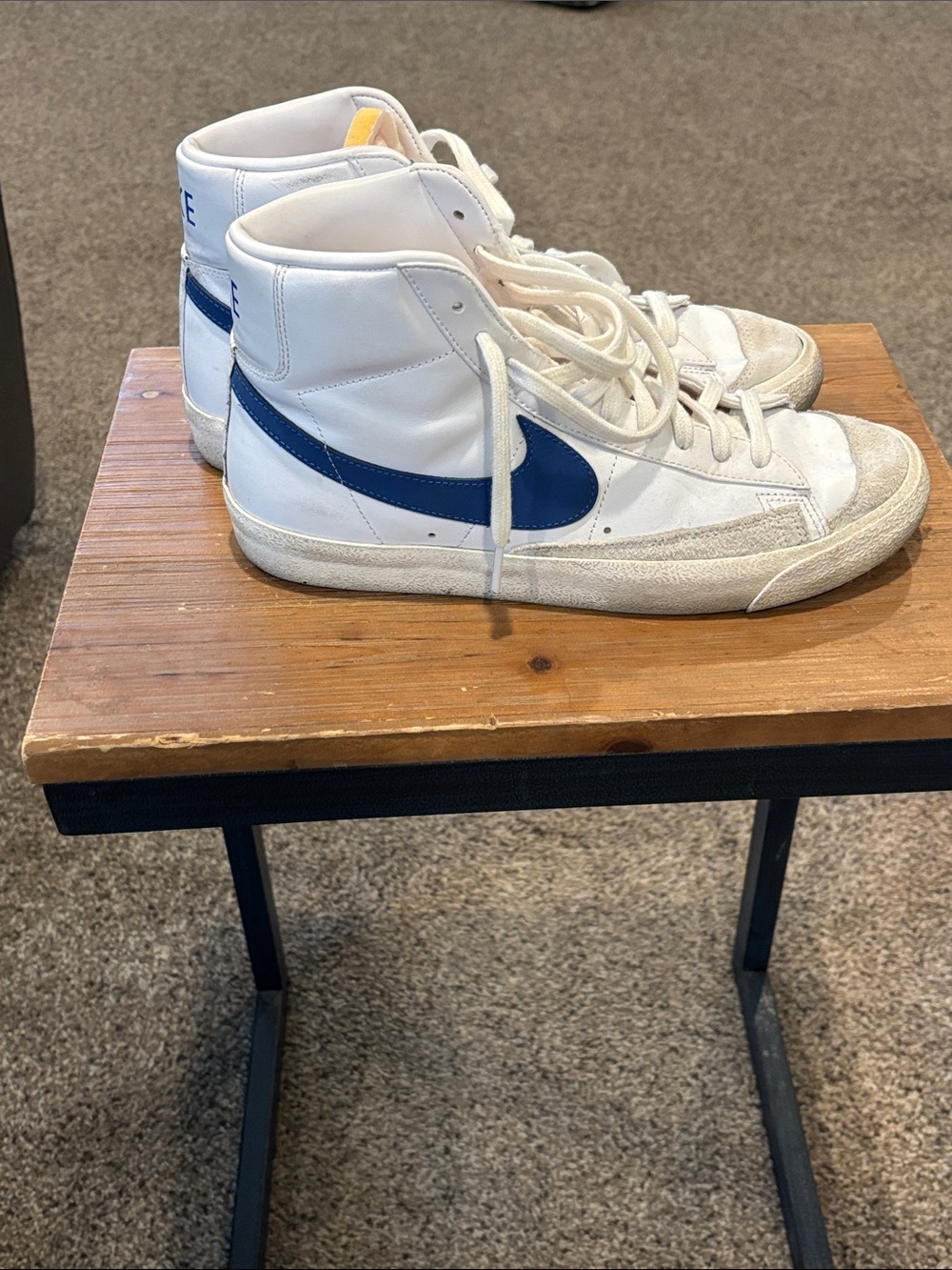 Nike White High-Top Sneakers with Blue Swoosh Accent